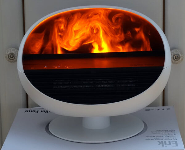 Flammenoptik des Stadler Form Erik in orangefarbener Beleuchtung